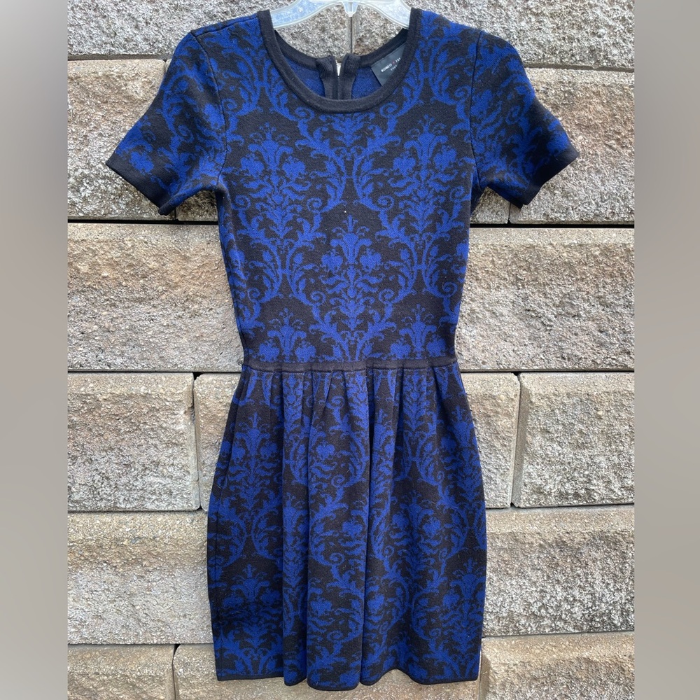 Romeo & Juliet Courure. Perfect fit and flare sweater material dress. SMALL